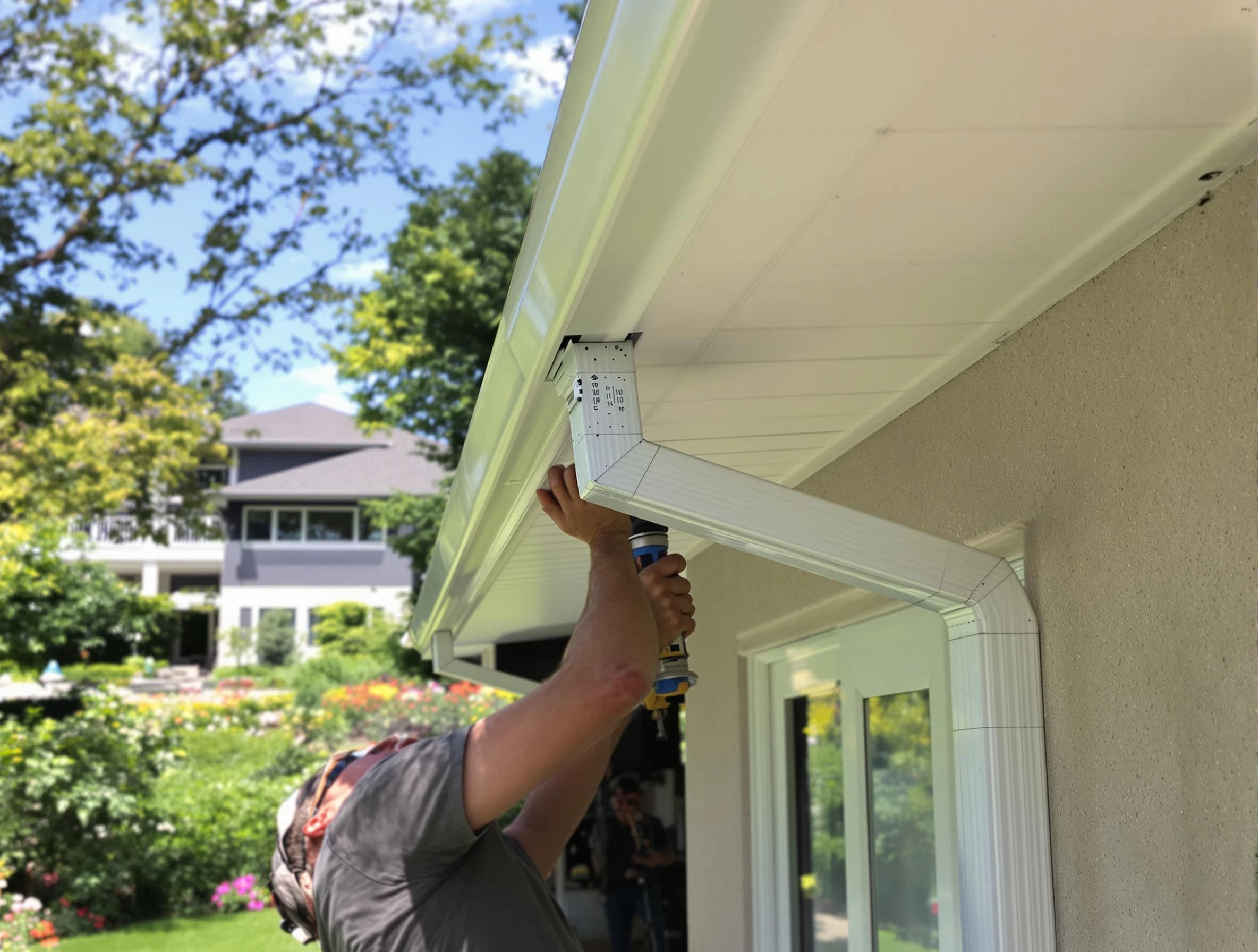 Lakewood Roofing Company technicians performing gutter installation in Lakewood, OH