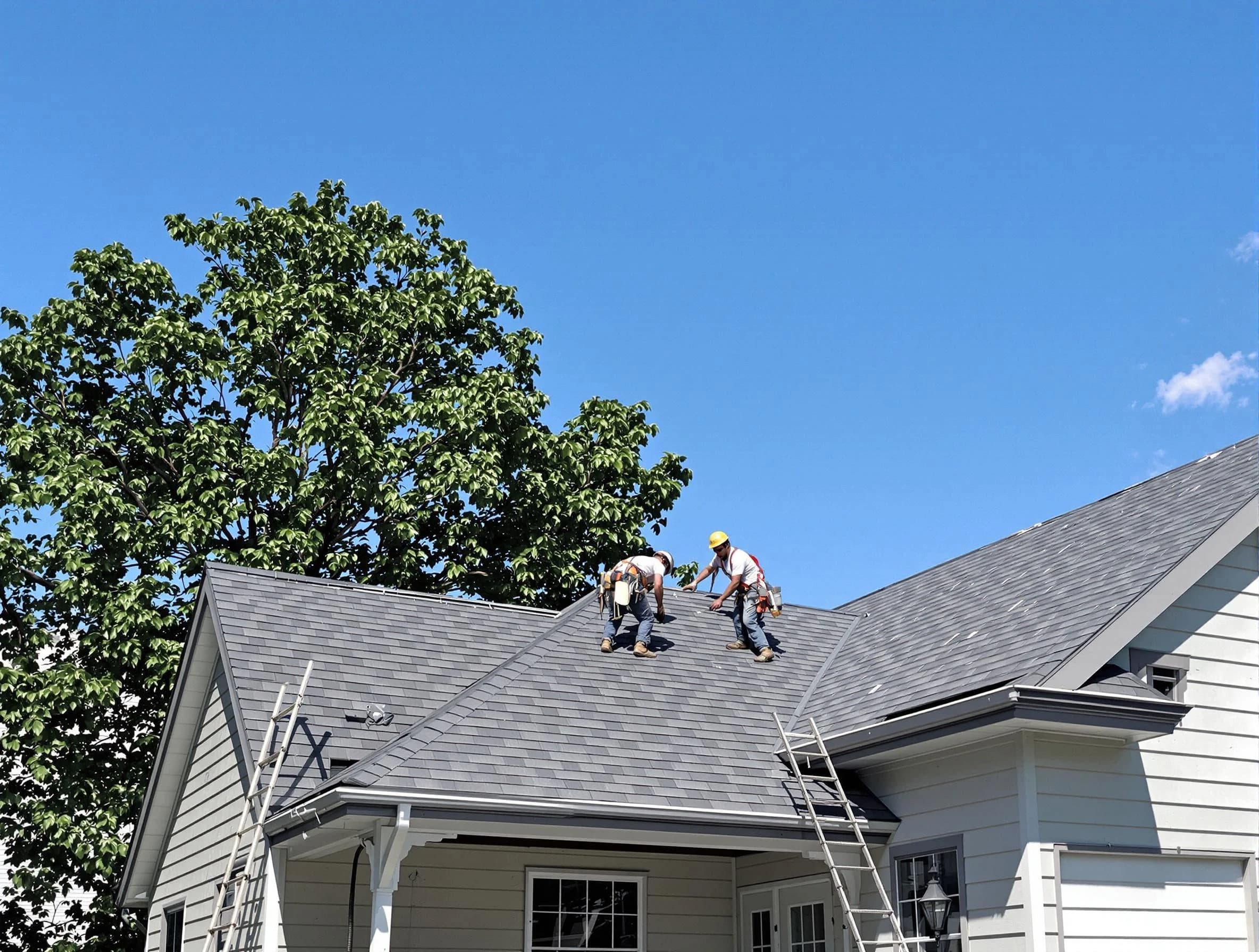 Lakewood Roofing Company crew finalizing a roof installation in Lakewood, OH