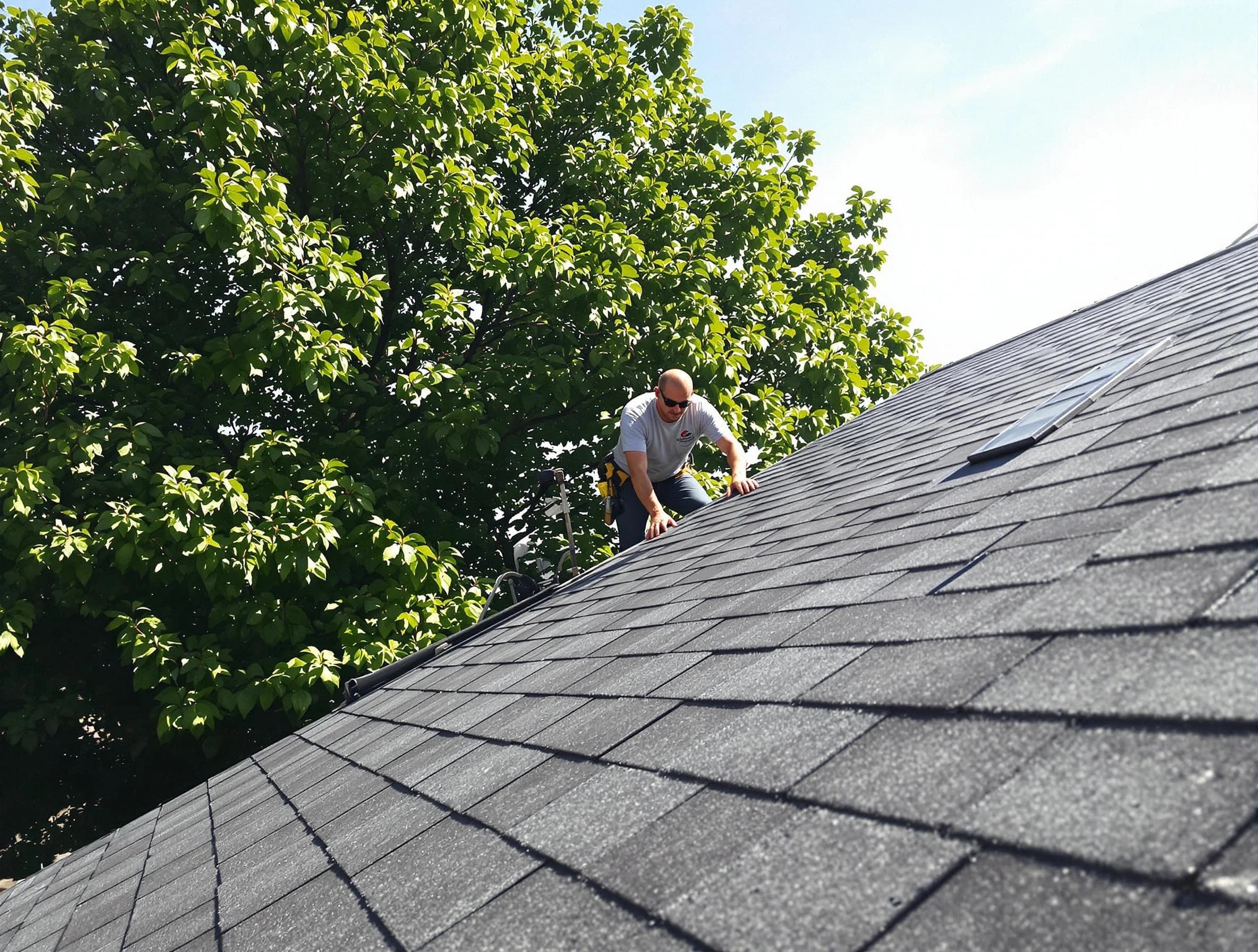 Certified roofers from Lakewood Roofing Company working in Lakewood, OH